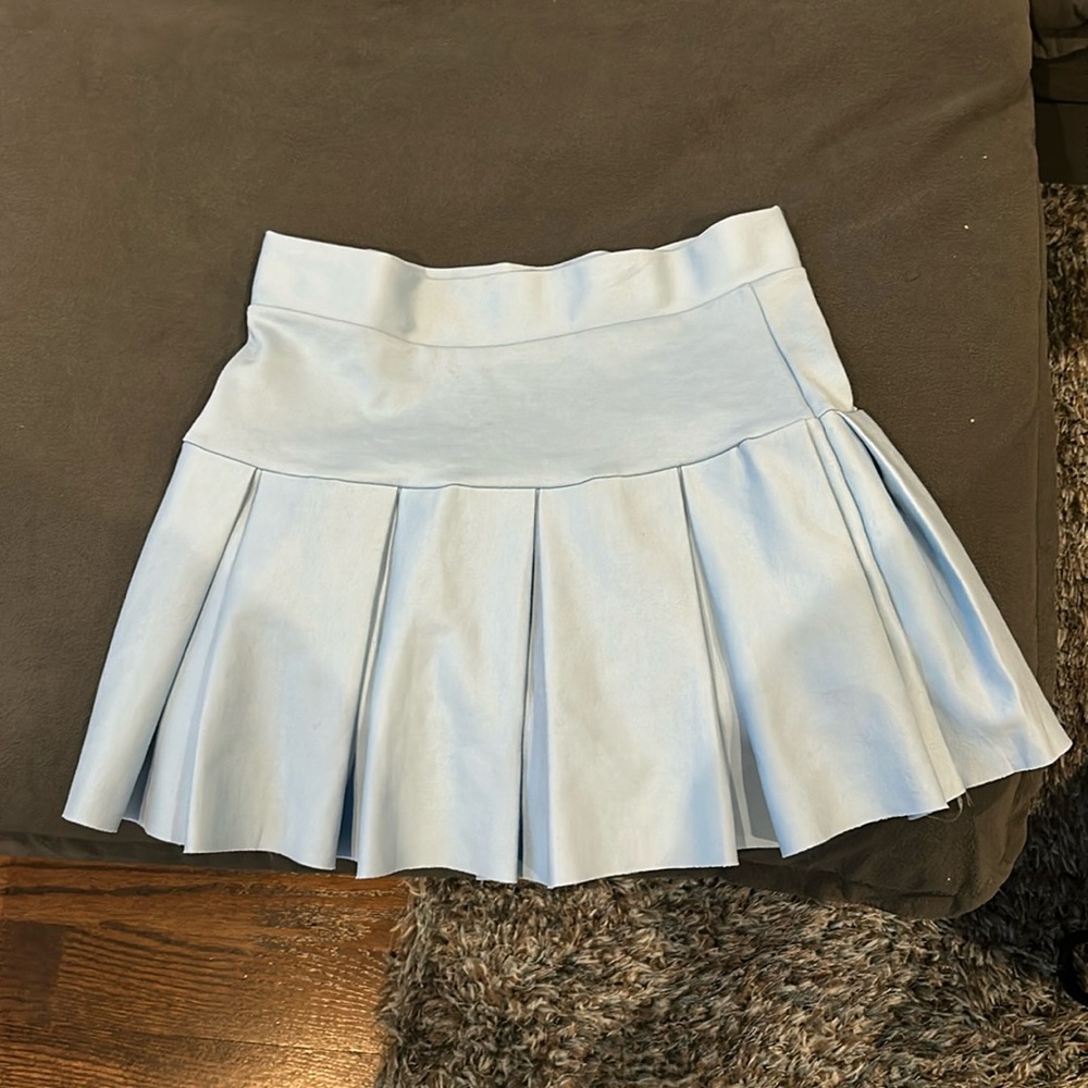 Blue skirt with built in shorts. Never worn, perfect condition